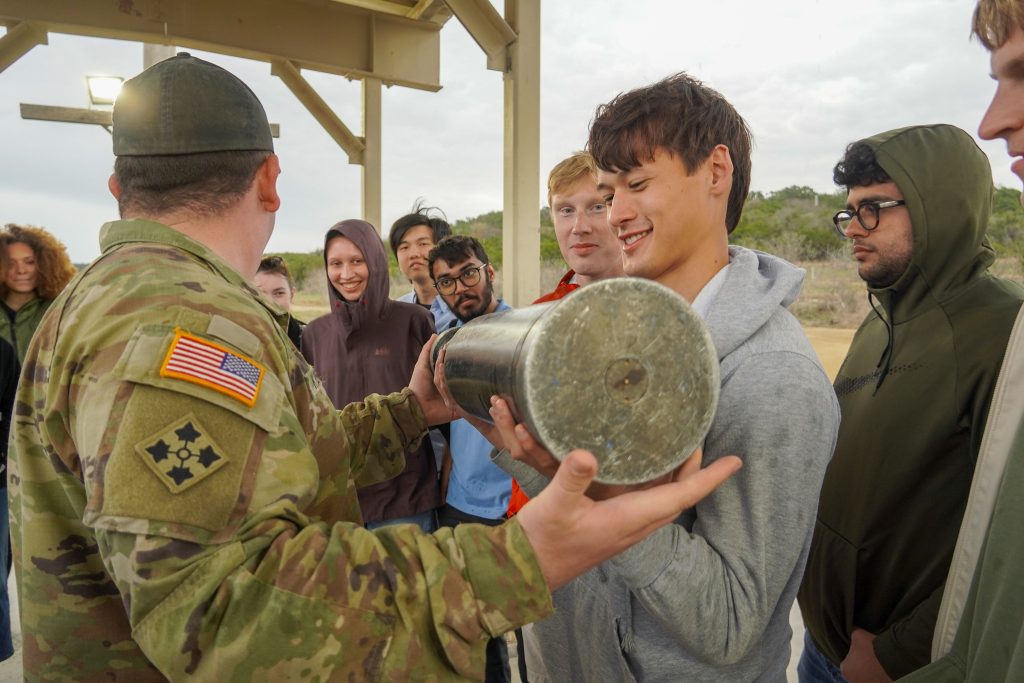 Students at Fort Hood handling munitions